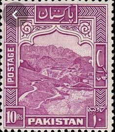 an old pakistan stamp with the image of a river and mountains in purple, on a black