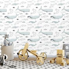 an animal themed wallpaper with wooden toys