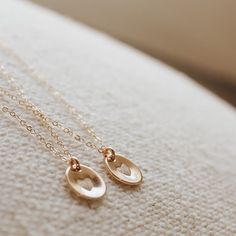 Show your sisterly love with our Sisters Necklace Set, featuring two delicate hand-stamped heart charms on adjustable chains. Available in either gold-filled or sterling silver, this set is perfect for siblings who want to share a symbol of their bond. Each charm measures 3/8 inches and is lovingly crafted with a unique heart stamp, representing the special connection between sisters. The chains can be adjusted from 16 to 18 inches, ensuring a perfect fit for both of you. For those who want a li Sister Necklace Set, Mother Daughter Necklaces Set, Sisters Necklace, Cute Sister, Sisterly Love, Mother Daughter Necklace, Sister Necklace, Necklace Extender, Heart Stamp