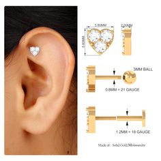 Product Details This minimal and trendy Heart Earring is a charming accessory for various occasions, adorned with Round Cut Moissanites in a Prong Setting. It can be worn on your Conch, Helix, Cartilage, or Upper Lobe Piercings, and the Flat Back Closure to keep it securely in place. Adorn yourself with this lovely Gold Heart Earring for a special occasion, or present it as a Birthday or Anniversary Gift to your loved one. Product Information SKU SHP-BODYJ022210063 Length 5.8 mm Width 5.8 mm Height 2 mm Weight 0.72 gm (Approximate) MOISSANITE INFORMATION No.of Stones 3 Pieces Total Weight 0.27 Carat (Approximate) Dimension(approx) Round-2.50X2.50 mm-3 Pcs Color White Cut Brilliant Shape Round Setting Type Prong-Setting Quality Grade D-VS1 View More Product Parent Collection Handle cartilag Marquise Diamond Earrings, Upper Lobe Piercing, Conch Stud, Second Hole Earrings, Upper Lobe, Ear Crawler Earrings, Gold Heart Earring, Helix Earring, Princess Cut Moissanite