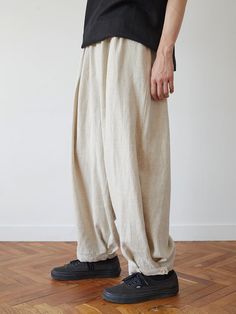 This is a casual and comfortable linen pants that are made out of sturdy linen 100% fabric. With a wide silhouette and adjustable buttons on the hem, it can be easily styled for your daily casual outfit.- Linen 100% fabric- Coarse texture and balloon silhouette- Adjustable buttons on the hem Cream Linen Pants With Pockets, Casual Ramie Bottoms With Relaxed Fit, Relaxed Fit Khaki Linen Pants, Relaxed Fit Khaki Linen Bottoms, Relaxed Fit Linen Khaki Bottoms, Relaxed Fit Linen Pants In Khaki, Khaki Relaxed Fit Linen Bottoms, Khaki Relaxed Fit Linen Pants, Khaki Linen Pants Relaxed Fit