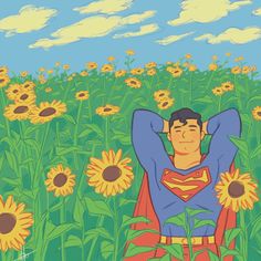 a man sitting in a field of sunflowers with his arms behind his head