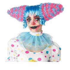 a woman with blue hair and clown makeup is wearing a pink, blue and white wig