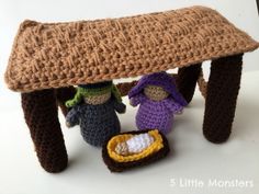 crocheted nativity scene displayed on white surface