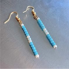 Handmade Beaded Minimalist Drop Earrings Turquoise Matte And Cream White Colors Features: Seed Bead Drop Earrings Featuring A Colorful And Playful Simple Pattern. Made With High Quality Glass Matte Colored Seed Beads. They Are Handmade By Me And Feature Gold Colored Earring Hooks. Lightweight The Perfect Gift! One Size (Measurements In Pictures) Perfect Condition Brand New. Offers Welcome Or Bundle With More Items For An Extra Discount! Bead Drop Earrings, Cream White Color, Earrings Turquoise, Beaded Drop Earrings, White Colors, Earring Hooks, Hand Crafted Jewelry, Crafted Jewelry, Simple Patterns