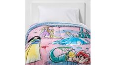 the little mermaid bedding set is pink and blue with princesses on it's side