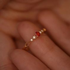 Dainty Ruby Gold Ring, July Birthstone Rings, Ruby Diamond Ring, Red Ruby Stacking Ring, Genuine Ruby Rings, Graduation Ring, Casual Rings We use the highest quality moissanite! Moissanite: ✦ Color: D Colorless ✦ Clarity: VVS1 OR All our diamonds are 100% natural. We use only conflict-free diamonds and gemstones. Diamond: ✦ Color: F-G ✦ Clarity: SI1-VS ✦PRODUCT DETAILS✦ → center stone: natural ruby → accent stone: diamonds Also available in other colored gemstones upon request. Please get in tou Elegant Red Crystal Round Ring, Elegant Red Round Crystal Ring, Elegant Red Promise Stackable Rings, Elegant Red Ruby Open Ring, Elegant Red Open Ring Jewelry, Red Garnet Promise Jewelry, Elegant Red Garnet Stackable Rings, Elegant Red Stackable Promise Rings, Red Birthstone Jewelry For Promise