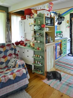 a living room filled with furniture and lots of clutter