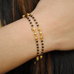 18K Gold Bracelet. Gold Chain with Black Beads. Mangalsutra Bracelet. Layered Gold Bracelet. Indian Black Bracelet With Gold Beads, Gold Jewelry With Black Beads, Handmade Gold Chain Bracelet With Round Beads, Black Beaded Bracelet As Gift, Black Beaded Chain Bracelet For Gift, Gift Black Beaded Chain Bracelet, Black Beaded Bracelets With Gold Beads For Gifts, Gold Beaded Chain Rosary Bracelet With Round Beads, Gold Rosary Bracelet With Beaded Chain