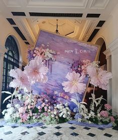 a large floral display with pink and white flowers