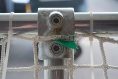 a close up view of the side of a soccer goal net