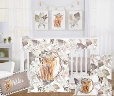 a baby crib bedding set with an image of a cow and calf on it