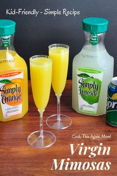 three glasses filled with orange juice next to two bottles of lemonade and an empty bottle