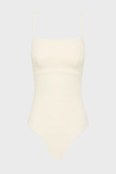 The Aerin One Piece in Pearl is an elegant, contemporary swimsuit with a flattering square neckline. With a bust panel, hidden under-bust support and removable cups, Aerin is supremely flattering to a woman's figure. Cut from our technically advanced Sculpteur® fabric with 3-D stretch, Aerin will support the bust and streamline the body. A chic swimsuit that idea for larger busts, suiting cup sizes B to DD. Luxury fabric sustainably made in Italy. Elegant White Swimwear With Built-in Bra, Modern Swimwear With Built-in Bra For Summer, Shaping Swimwear With Built-in Bra For Summer, Square Neck Bodysuit With Built-in Bra, Solid Shaping Shapewear For Summer, Summer Shapewear For Swimming, Chic Square Neck Swimwear For Summer, Summer Seamless One-piece Shapewear, Summer One-piece Shapewear With Lined Body