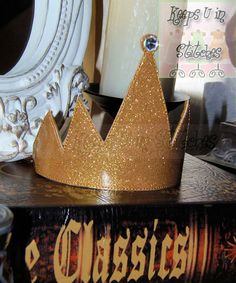 a crown sitting on top of a book