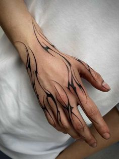 a woman's hand with black lines on it