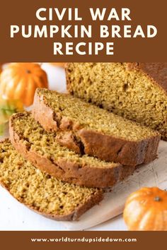 a close up of sliced bread on a cutting board with pumpkins in the background