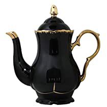 a black tea pot with gold trimmings