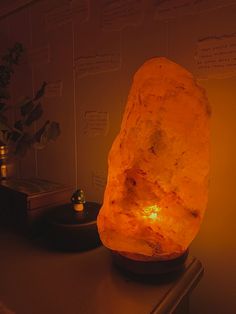 a rock lamp sitting on top of a table