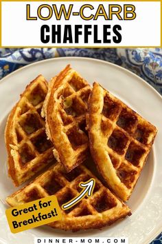 a white plate topped with waffles on top of a blue and white table cloth