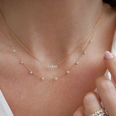 The Diamond Multifaceted Mini Bar Necklace makes a statement with .05 carats of diamonds varying from round to baguette to pear. Now that you don't have to choose between facets, the only question is: Will you wear it solo or layered? Tiny Diamond Necklace, Diamond Bar Necklace, Diamond Bar, Tiny Diamond, Delicate Rings, Mini Bar, Gold Chain Necklace, Bar Necklace, White Diamond