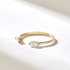 Elegant& Minimalist Real Solid Gold Open Stackable Ring with half bezel settled natural marquise diamonds Features * Made to Order. * Gold KT: 10K, 14K, 18K * Custom Gold Color: Rose Gold, Yellow Gold, White Gold * Diamond Color-Clarity: D-E-F color VVS clarity * Total CTW: 0.18 ctw * Width of Band: 1.43MM * Thickness of Band: 0.67MM * Ready to Ship in 5-7 Business Days ✓ We care about the environment,the jewelry we cast is made with recycled gold. We source exclusively post-consumer material th Luxury Open Band Solitaire Jewelry, Luxury Open Ring Stackable Rings With Bezel Setting, Luxury Wide Band Open Ring For Promise, Luxury Classic Engraved Open Band Ring, Open Wedding Ring, Adjustable Open Band Diamond Ring For Promise, Stackable Marquise Diamond Wedding Ring, Stackable Fine Jewelry Bypass Ring For Wedding, Stackable Open Band Bypass Ring For Wedding