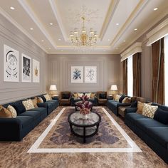 a living room filled with furniture and a chandelier