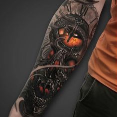 an arm with a clock and skull on it