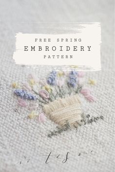 an embroidered piece with flowers on it and the words free spring embroidery pattern written below