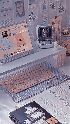 an apple computer sitting on top of a desk