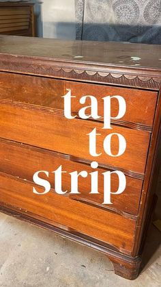 an old dresser with the words tap to strip on it