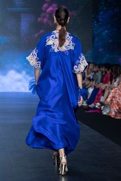 Blue silk kaftan featuring resham embroidered floral motifs, embellished by beads, sequins, pearls on a pleated flared silhouette, cut-out borders and side slits. Comes with inner tunic. - Aza Fashions Spring Kaftan With Embellished Kimono Sleeves, Spring Embellished Kaftan With Kimono Sleeves, Summer Evening Embroidered Kaftan, Festive Evening Kaftan With Floral Embroidery, Traditional Evening Kaftan For Summer, Traditional Summer Evening Kaftan, Traditional Evening Summer Kaftan, Summer Wedding Kaftan With Floral Embroidery, Summer Wedding Floral Embroidered Kaftan