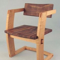 a wooden chair that is made out of wood