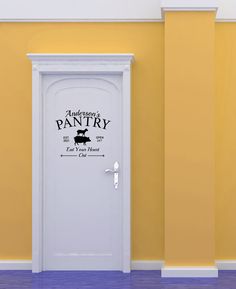 an open door with the words adventures pantry on it in front of a yellow wall