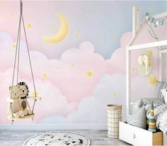 a child's bedroom with pink walls and stars on the wall, a teddy bear swing