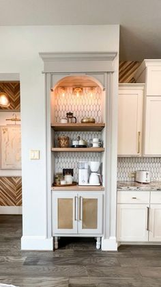 the kitchen is clean and ready to be used as a breakfast nook or bar