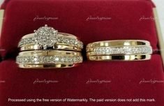 two gold wedding rings sitting on top of a red velvet ring box with white diamonds