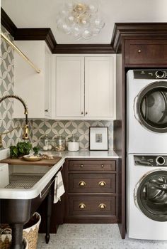 a washer and dryer in a small kitchen