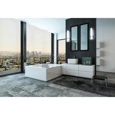 a modern bathroom with large windows overlooking the city