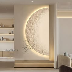 a living room filled with furniture and a large moon wall mural on the wall next to a couch