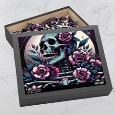 a box with a skull and flowers on it