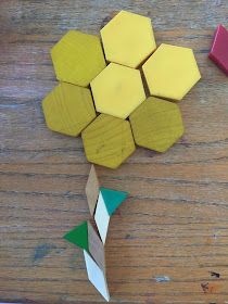 several different colored wooden blocks on a table