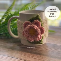 a crocheted coffee cup with a flower on it and the words instant download pattern below