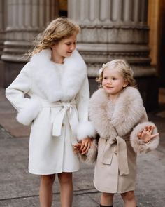 Matching for mom and daughter! Stunning Fall / Winter / Spring Off-White fur coat made from softest cashmere and wool, with luxurious natural fox fur trim at shawl collar and sleeves. A timeless belted peacoat design with double-breasted domed golden button closure and welt pockets. Elegant Cream Fur Coat With Faux Fur Trim, Girls Outwear, Long Fur Coat, White Fur Coat, Embroidered Tulle Dress, Floral Ruffle Top, Ivory Lace Dress, Christening Dress, Mom And Daughter