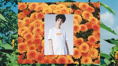 an image of a person in front of flowers