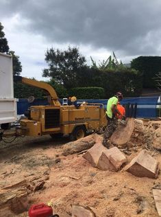 two men are working on the construction site