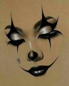 a drawing of a woman's face with black and white makeup on top of it