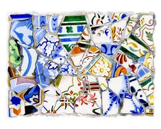 a piece of art that is made out of glass and has many different designs on it