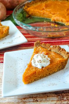 a slice of sweet potato pie on a plate next to some potatoes and a glass dish