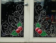 two glass doors with red cherries painted on them